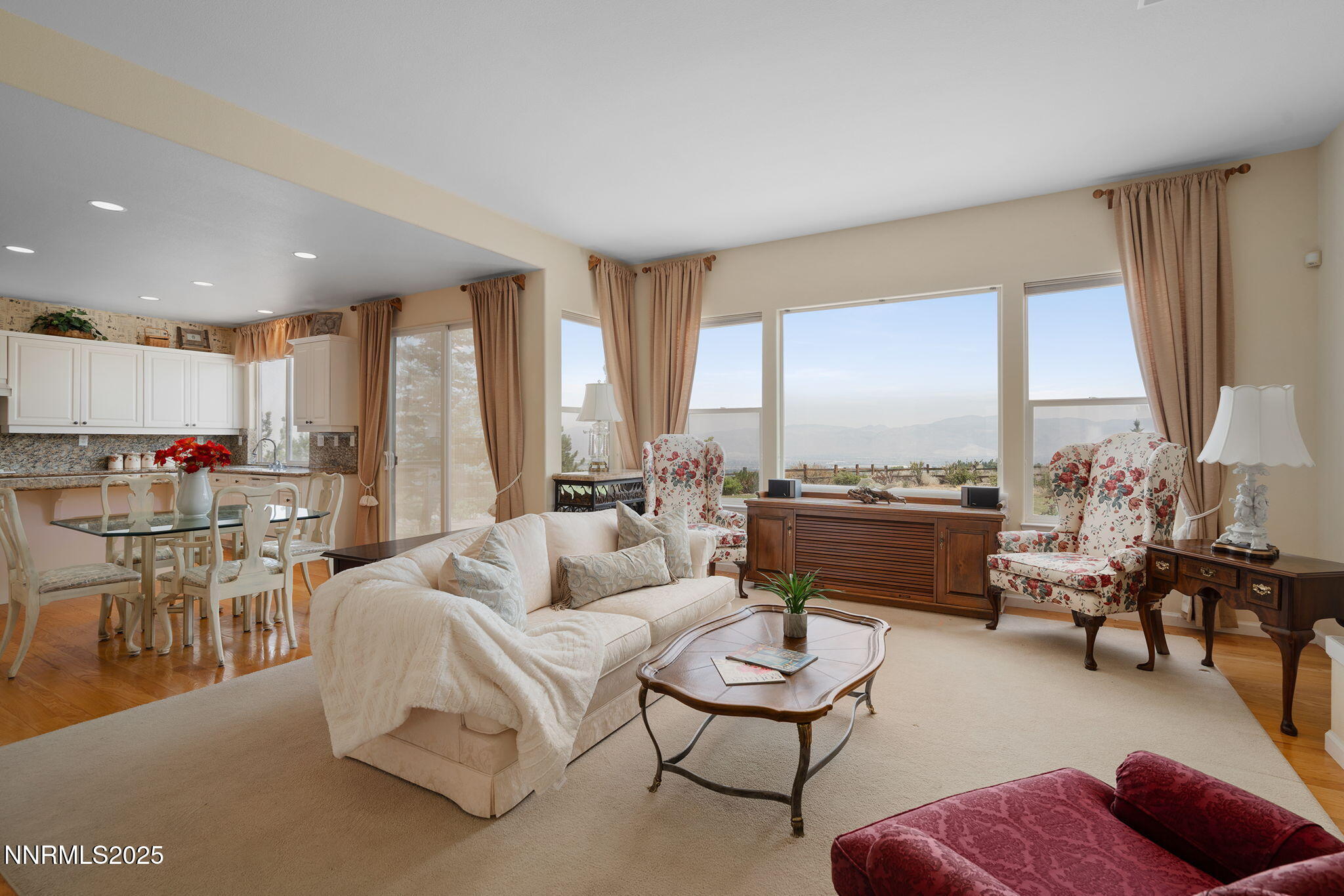 3206 Old Coach Court Reno, NV 89511 - Photo 12 of 40 a living room with furniture and a large window