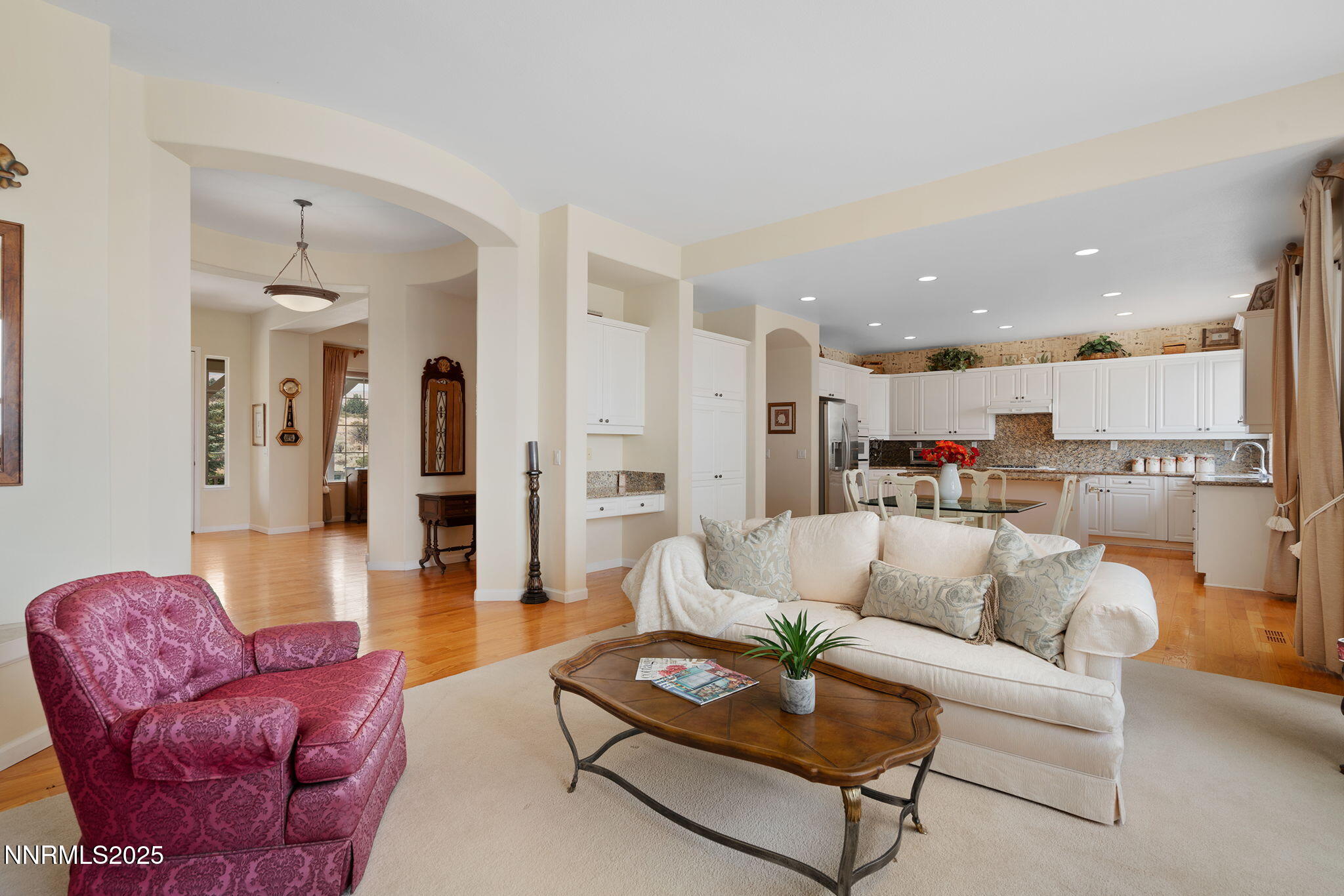 3206 Old Coach Court Reno, NV 89511 - Photo 13 of 40 a living room with furniture kitchen view and a table
