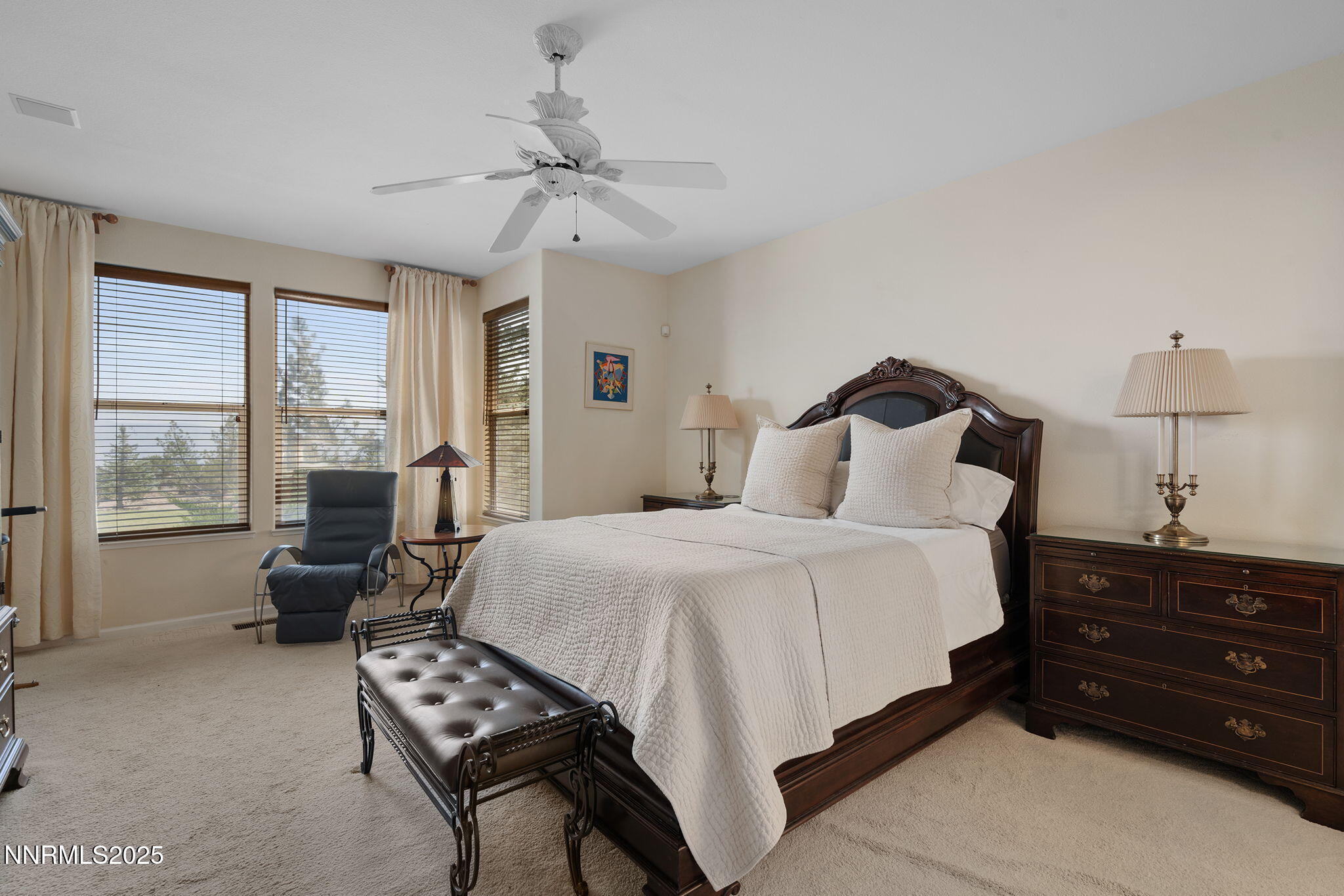 3206 Old Coach Court Reno, NV 89511 - Photo 23 of 40 a bedroom with a bed and wooden floor