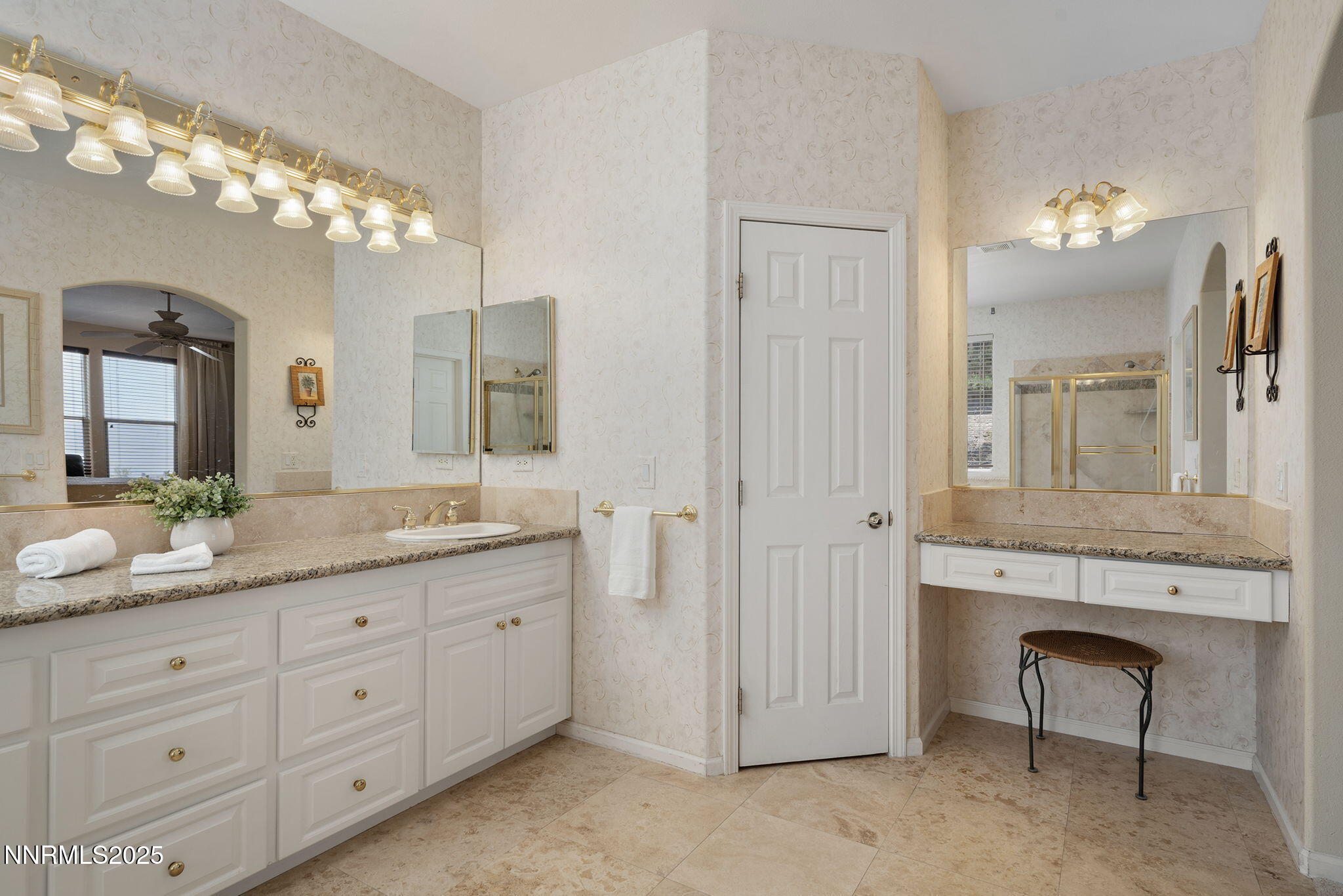 3206 Old Coach Court Reno, NV 89511 - Photo 27 of 40 a spacious bathroom with a granite countertop sink a mirror and a
