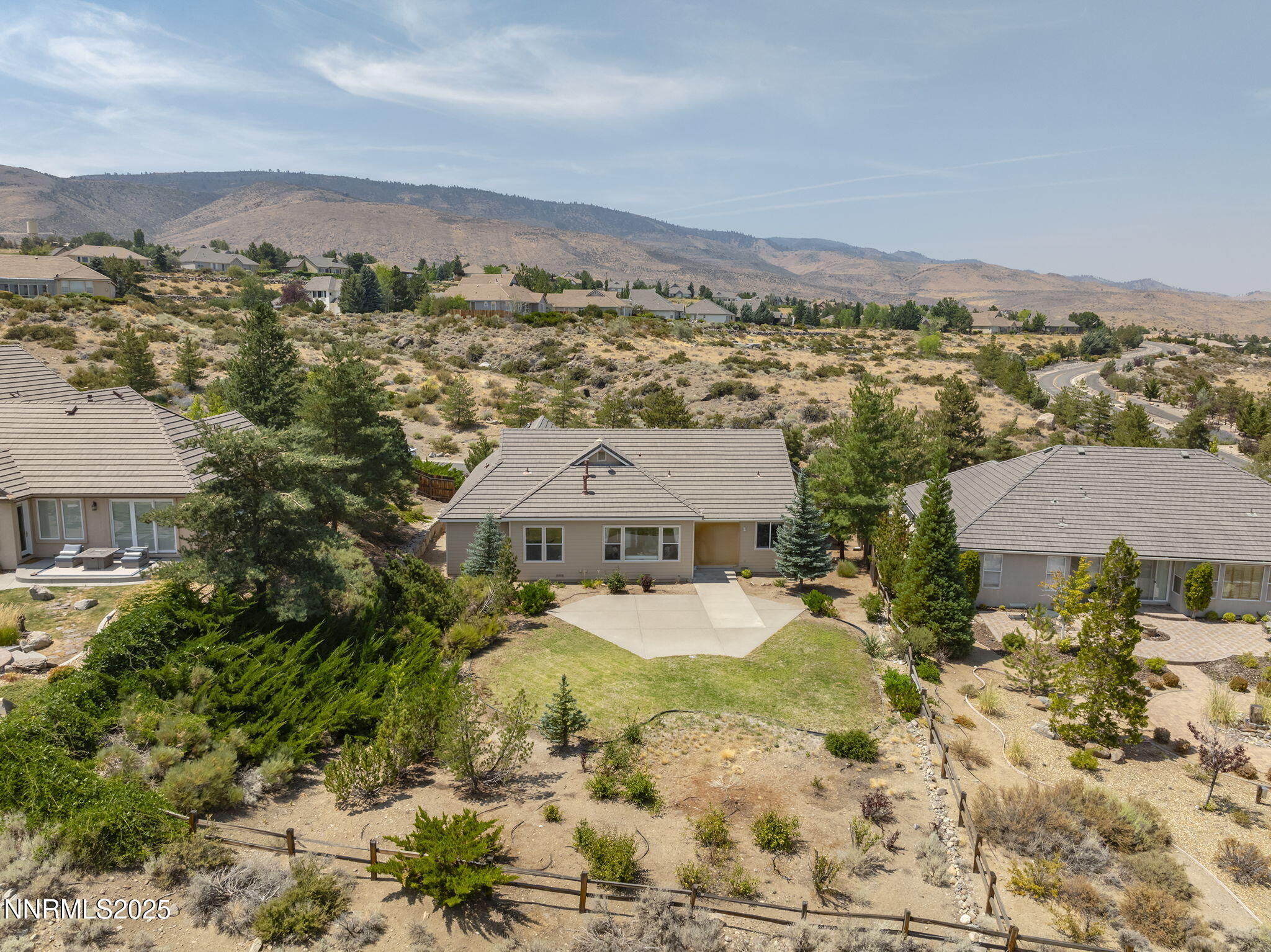 3206 Old Coach Court Reno, NV 89511 - Photo 33 of 40 an aerial view of a house with a yard and lake view