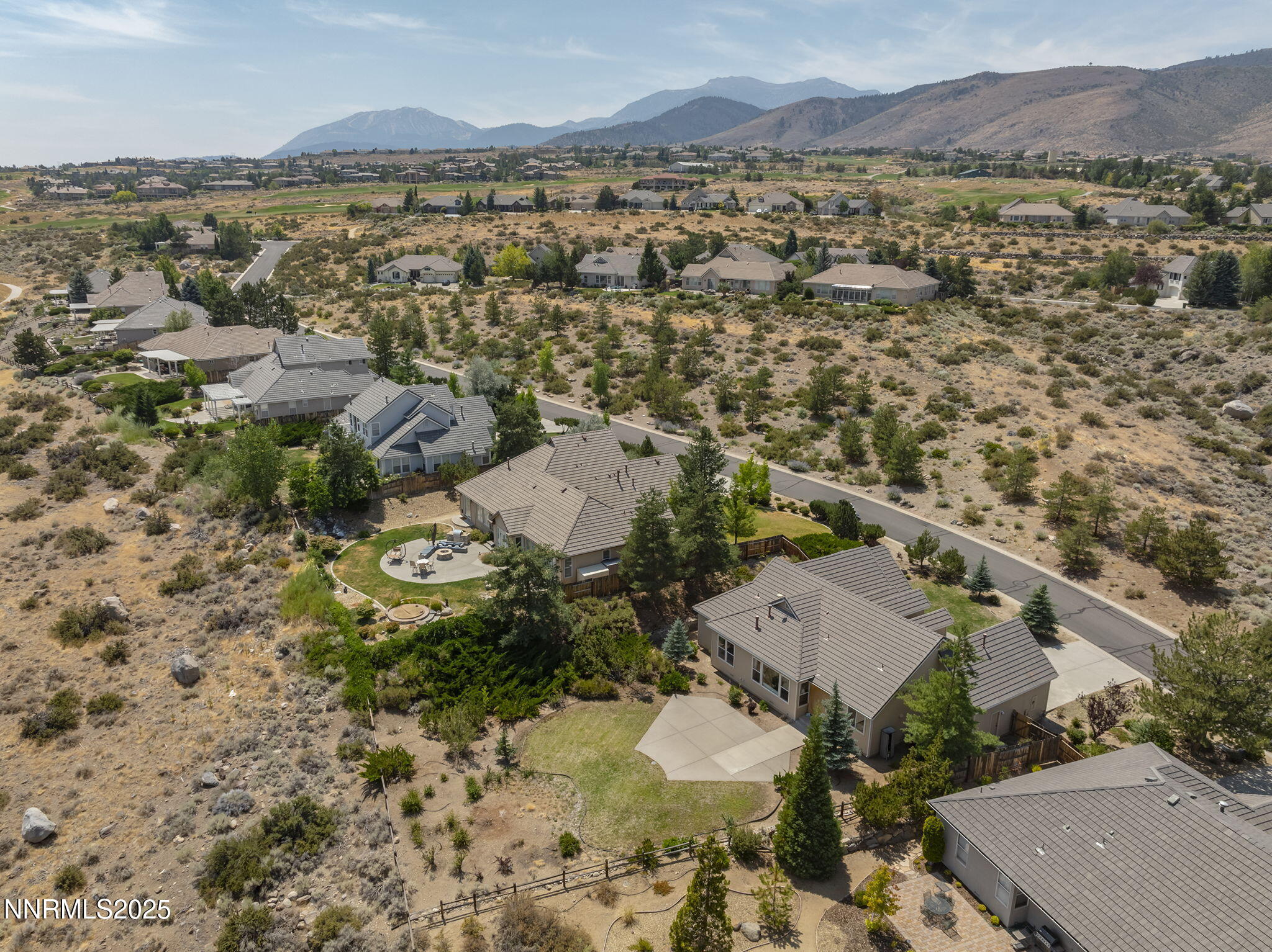 3206 Old Coach Court Reno, NV 89511 - Photo 36 of 40 an aerial view of residential house with outdoor space and mountain view