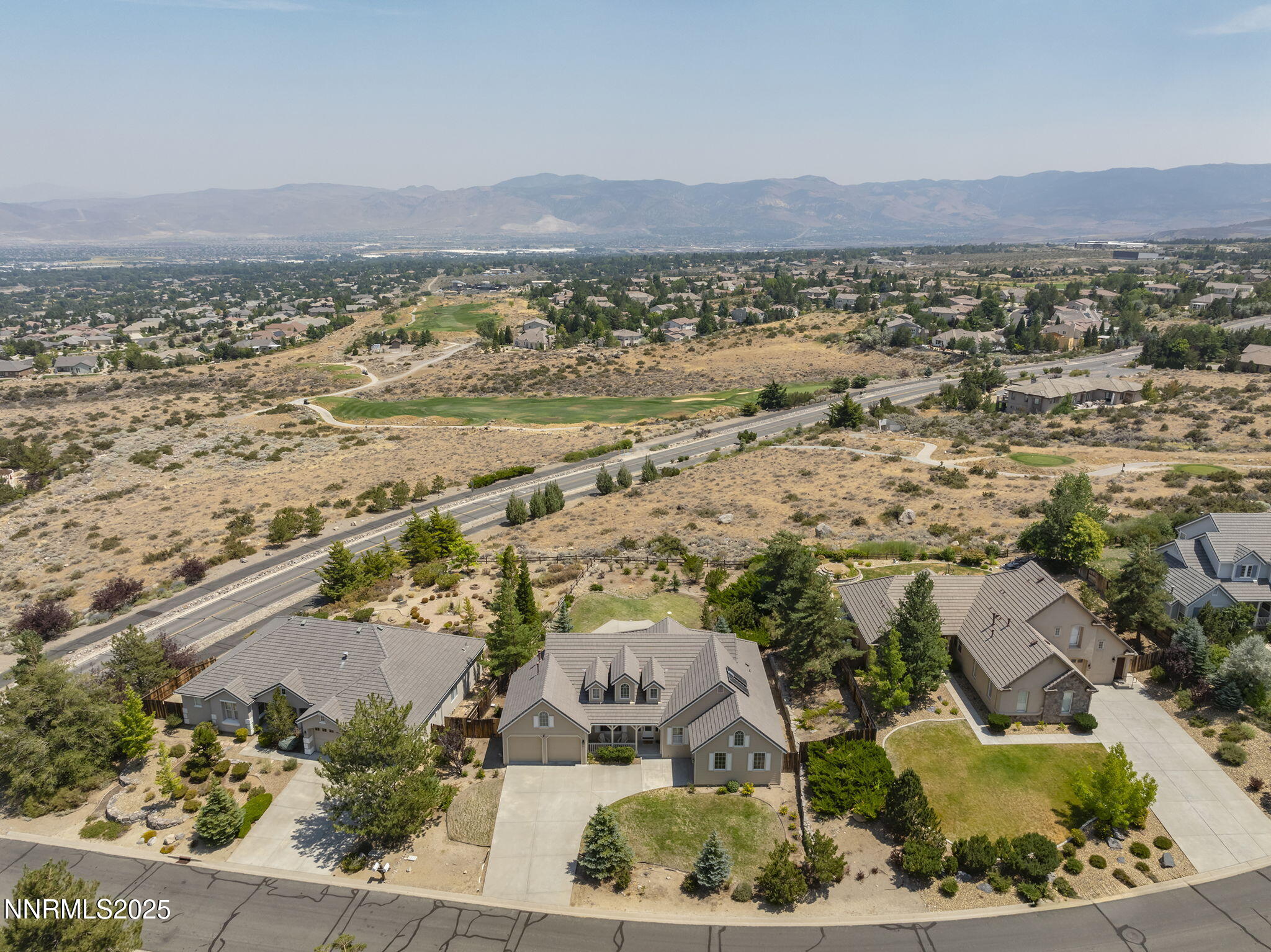 3206 Old Coach Court Reno, NV 89511 - Photo 38 of 40 an aerial view of a house with a yard