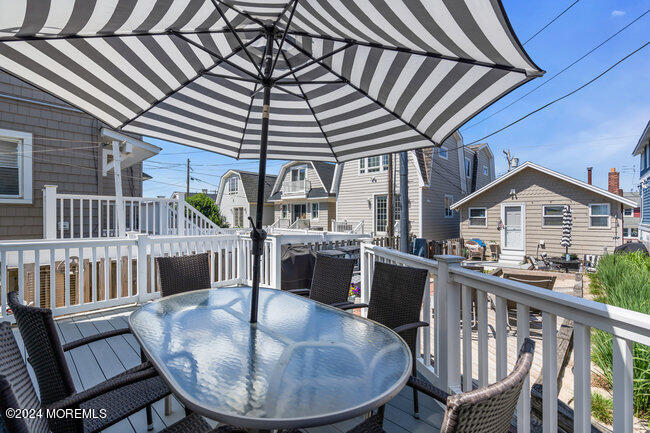 0 Beach Front Manasquan, NJ 08736 - Photo 10 of 47 a view of a dining room with furniture window and wooden floor