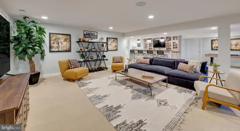 a living room with furniture and a couch