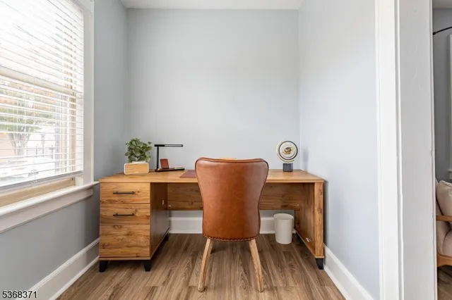 a view of table and chair in room