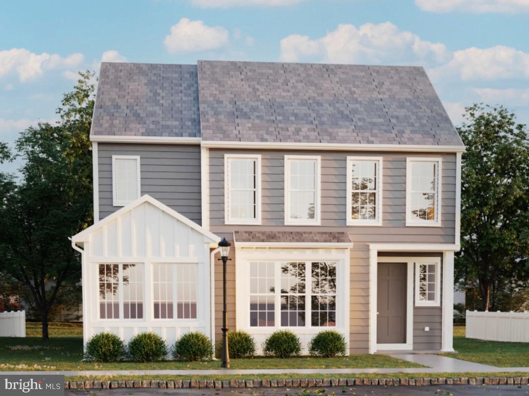 104 Merchant Avenue, Unit MARLOW Mount Joy, PA 17552 - Photo 2 of 23 a view of a white house with large windows and a yard