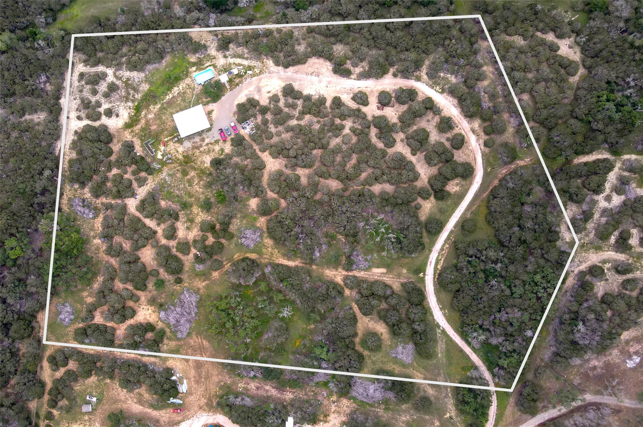 View of rural area with property boundaries highlighted and a desert landscape