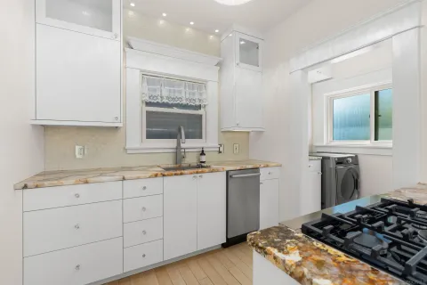 a bathroom with a shower and a toilet