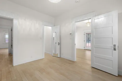 a view of a backyard with wooden fence