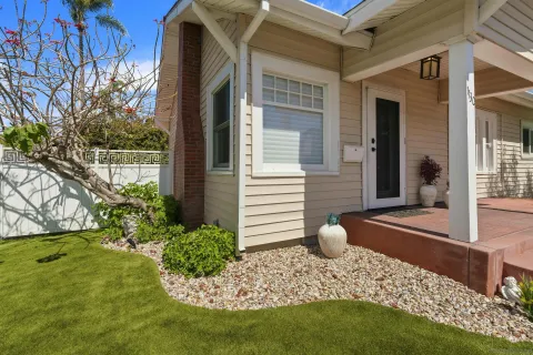 a view of house with backyard