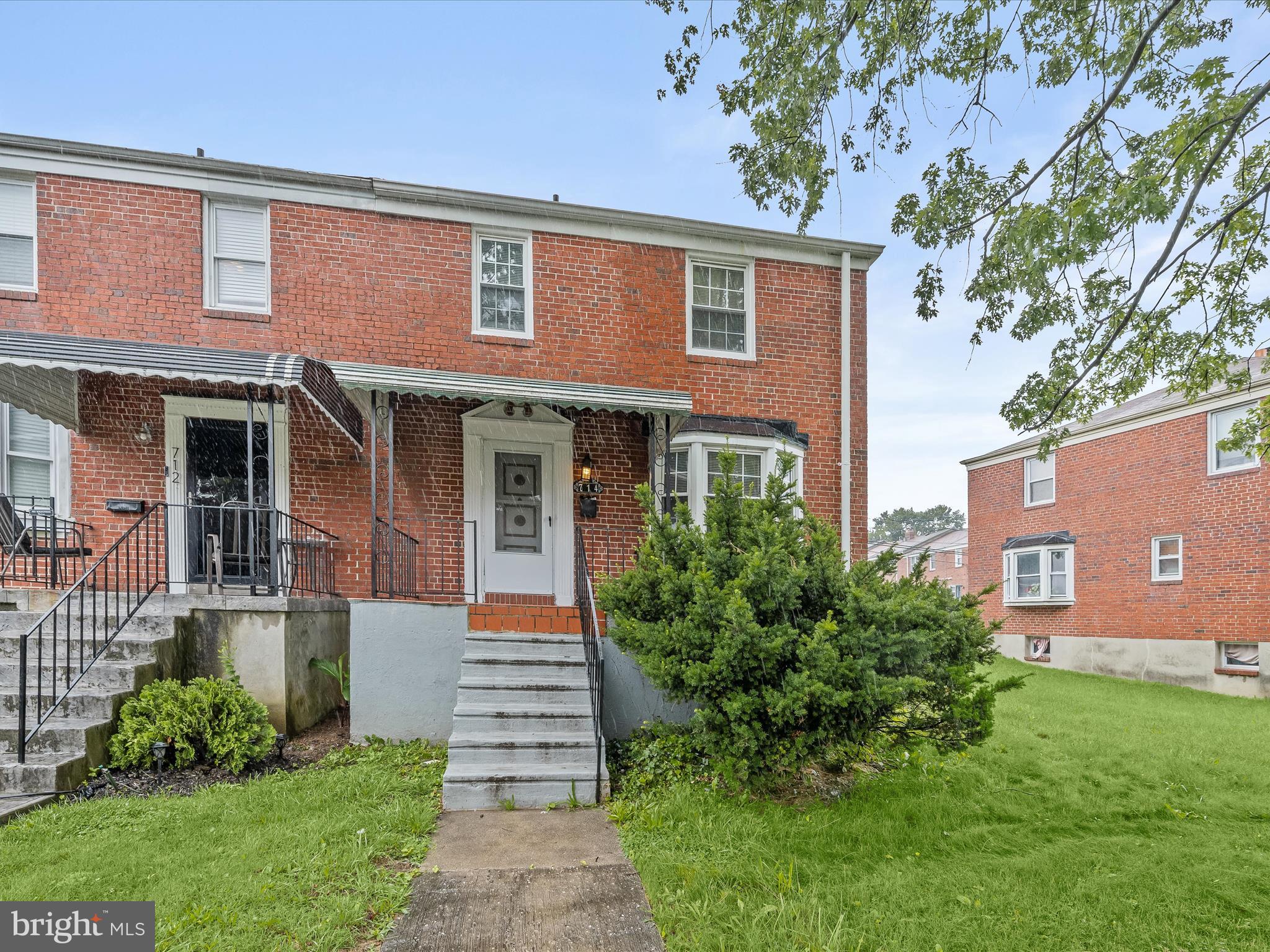 714 Stamford Road Baltimore, MD 21229 - Photo 1 of 31 front view of a house with a yard