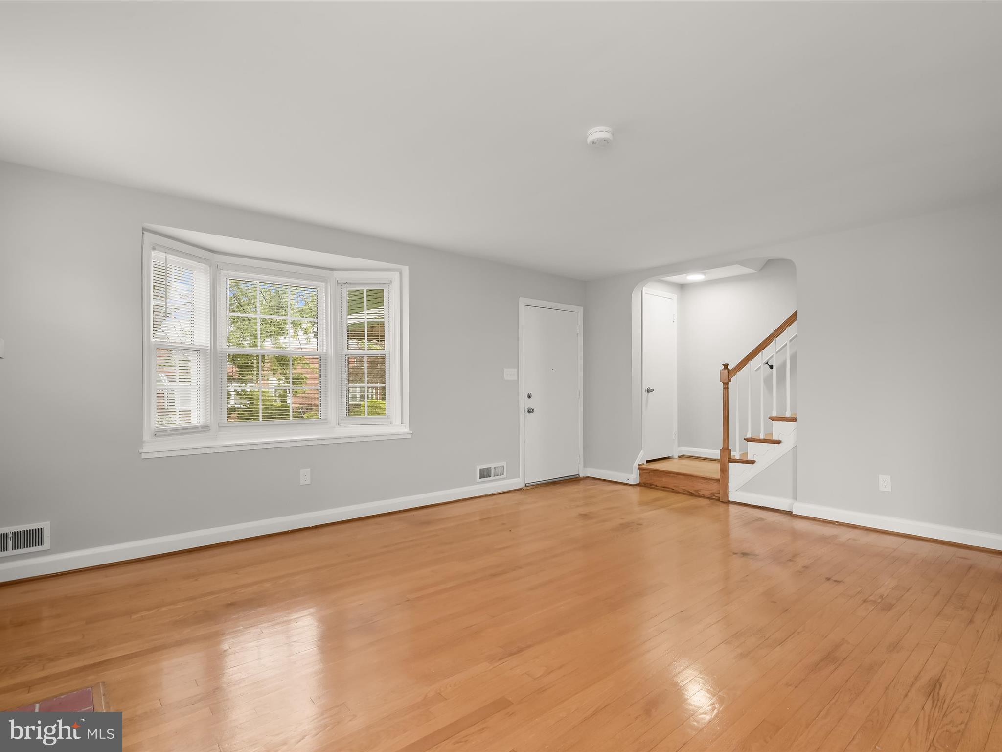 714 Stamford Road Baltimore, MD 21229 - Photo 3 of 31 a view of an empty room with a window