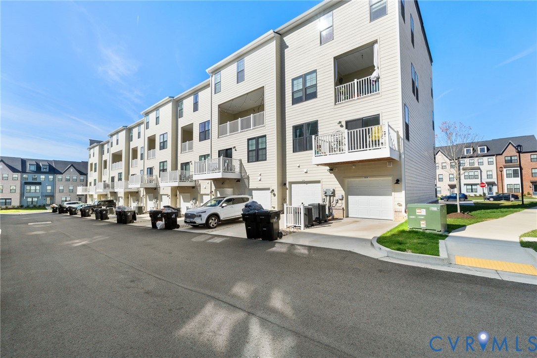 585 Hazel Place, Unit A Henrico, VA 23233 - Photo 26 of 26 a view of a street with cars