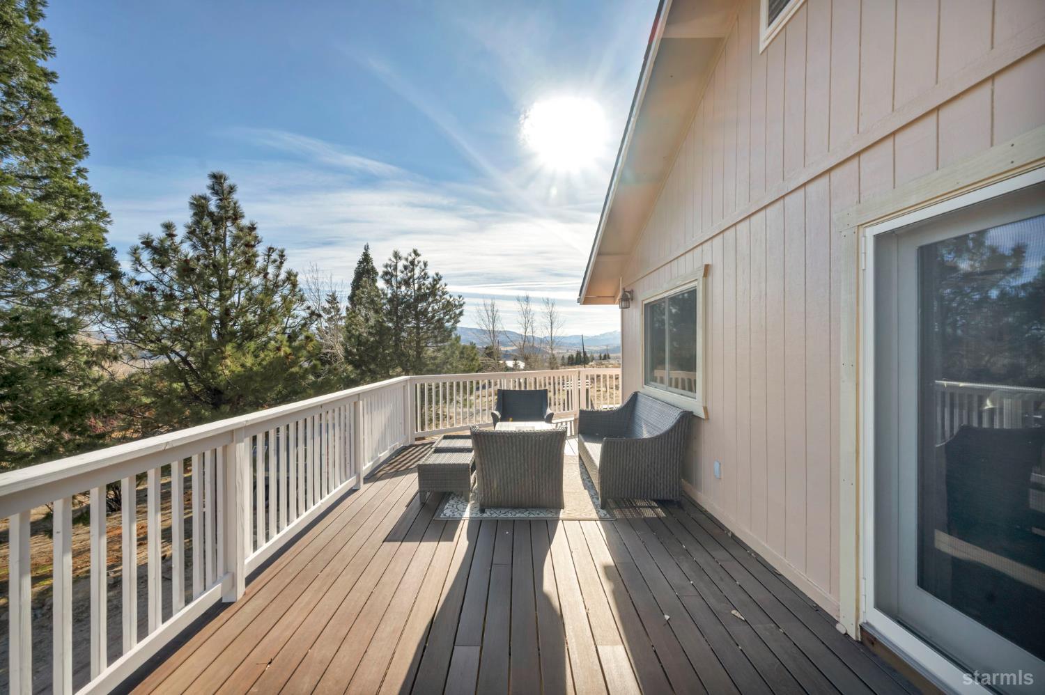 110 Carson View Markleeville, CA 96120 - Photo 6 of 39 a view of a balcony with couch and wooden floor
