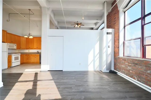 a view of kitchen with furniture and window