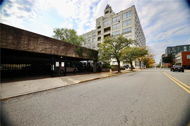 a view of a street with cars