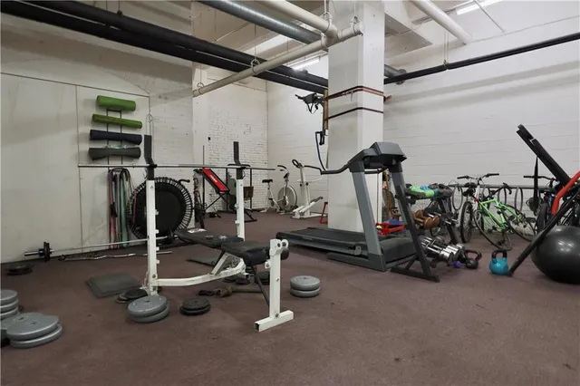 a view of a room with gym equipment