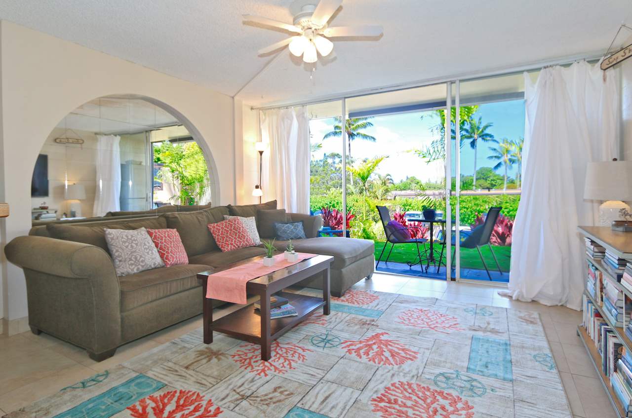 120 Hui Rd F, Unit B4 Lahaina, HI 96761 - Photo 1 of 19 a living room with furniture and a large window