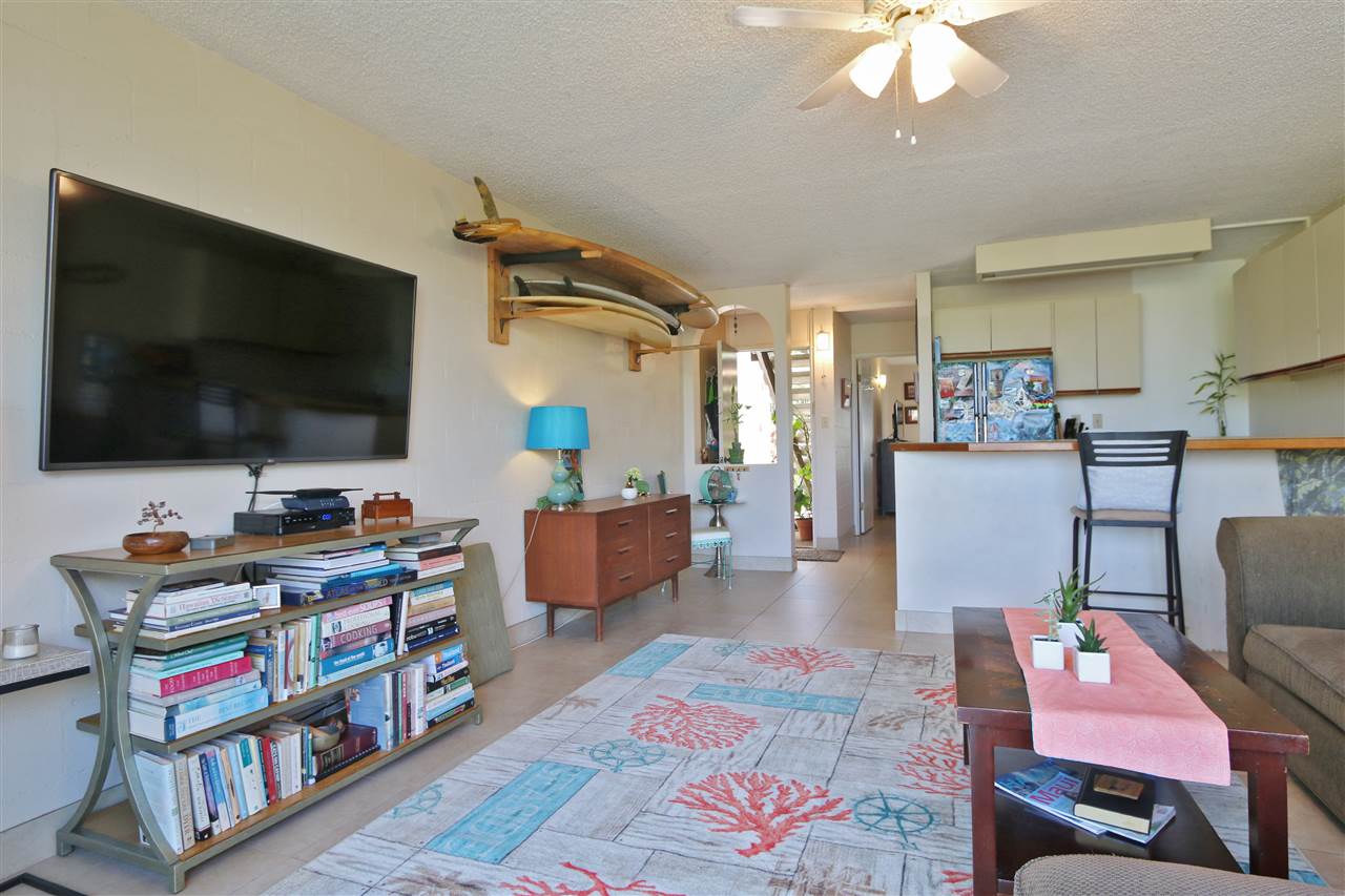 120 Hui Rd F, Unit B4 Lahaina, HI 96761 - Photo 11 of 19 a living room with furniture and a flat screen tv