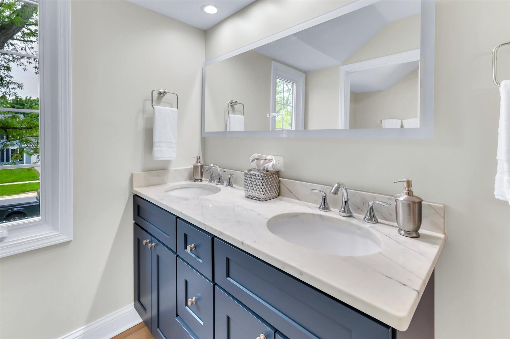 967 West Bauer Road Naperville, IL 60563 - Photo 30 of 37 a bathroom with a sink and a mirror