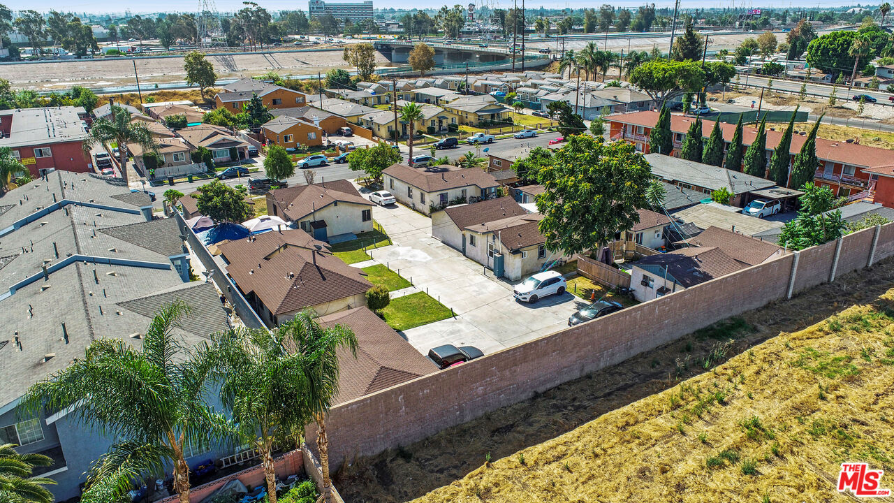 7101 Chanslor Avenue Bell, CA 90201 - Photo 17 of 20 an aerial view of a house with a garden and lake view