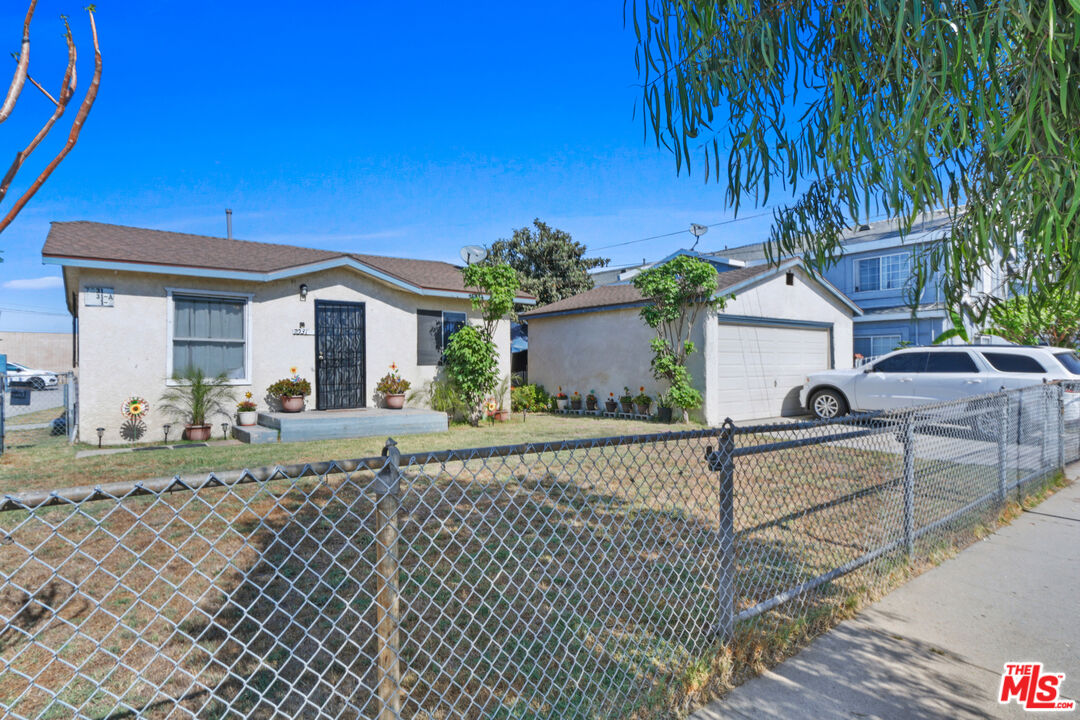 7101 Chanslor Avenue Bell, CA 90201 - Photo 3 of 20 a view of a house with backyard and sitting area