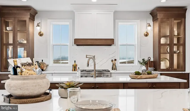 a living room with furniture and a mirror