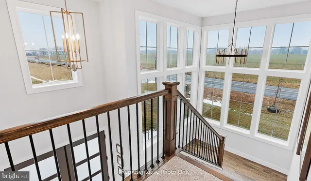 a view of porch with wooden floor and windows