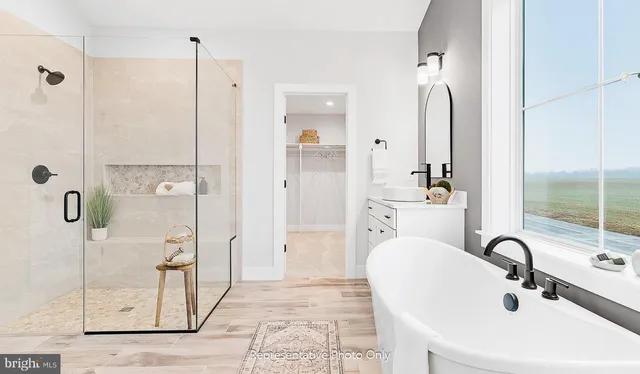 a bathroom with a sink and shower