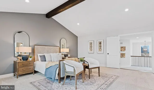 a bedroom with furniture and wooden floor