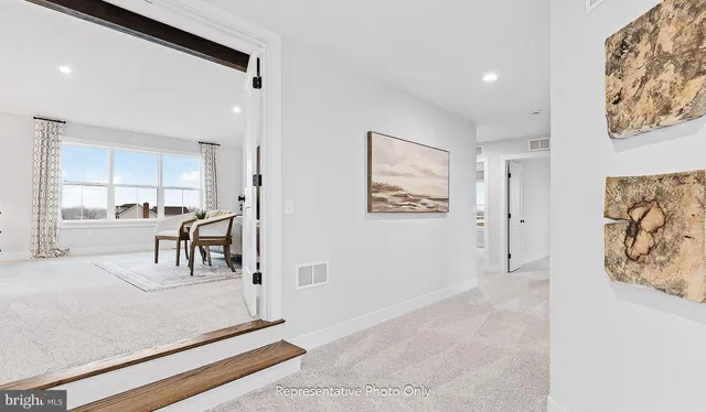 a view of a living room and window