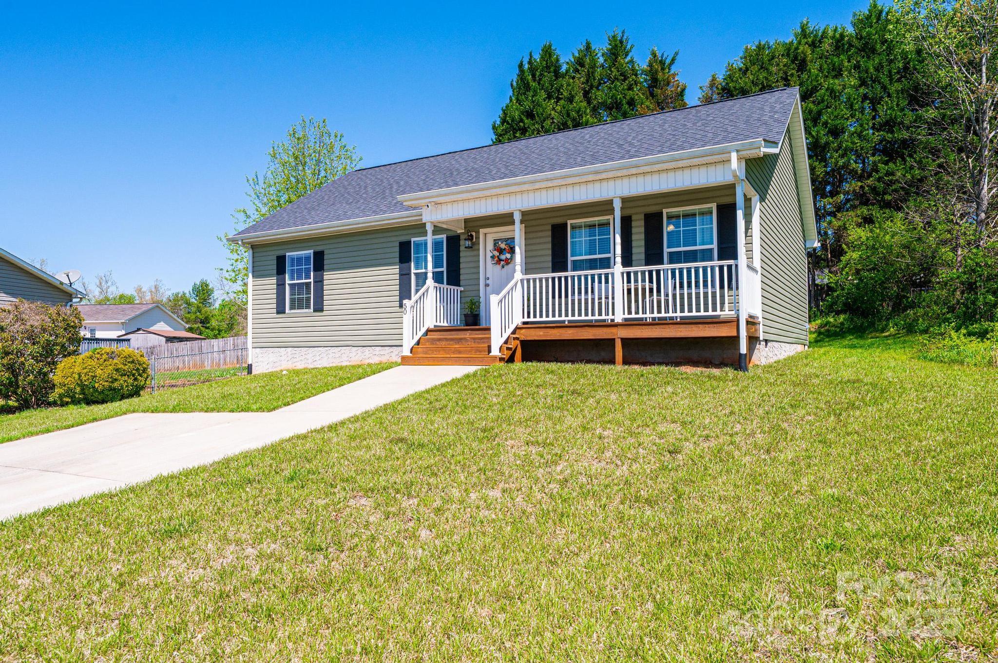 50 Serenity Lane Hickory, NC 28601 - Photo 1 of 33 a view of house with backyard and porch