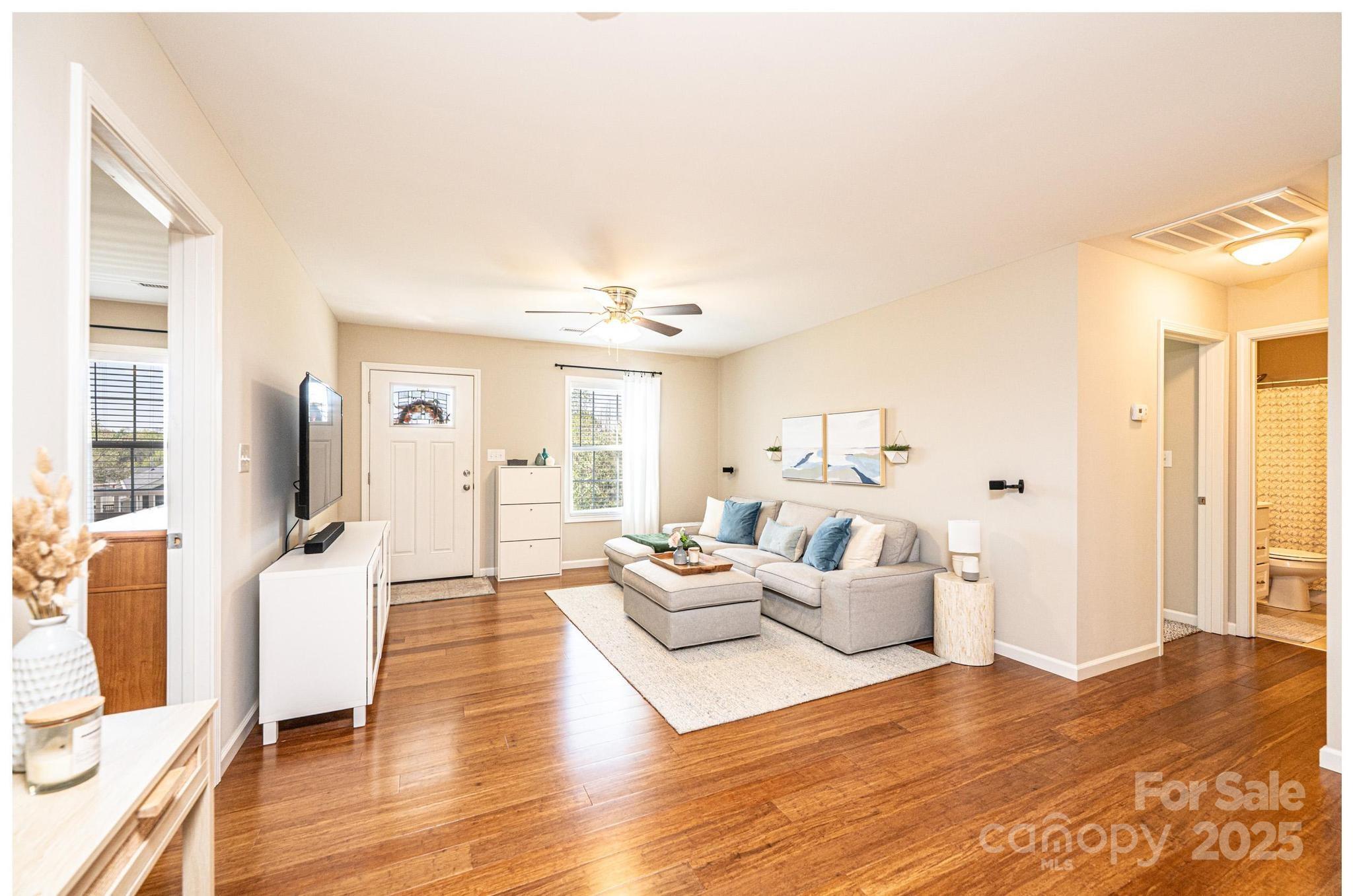 50 Serenity Lane Hickory, NC 28601 - Photo 15 of 33 a living room with furniture and a wooden floor
