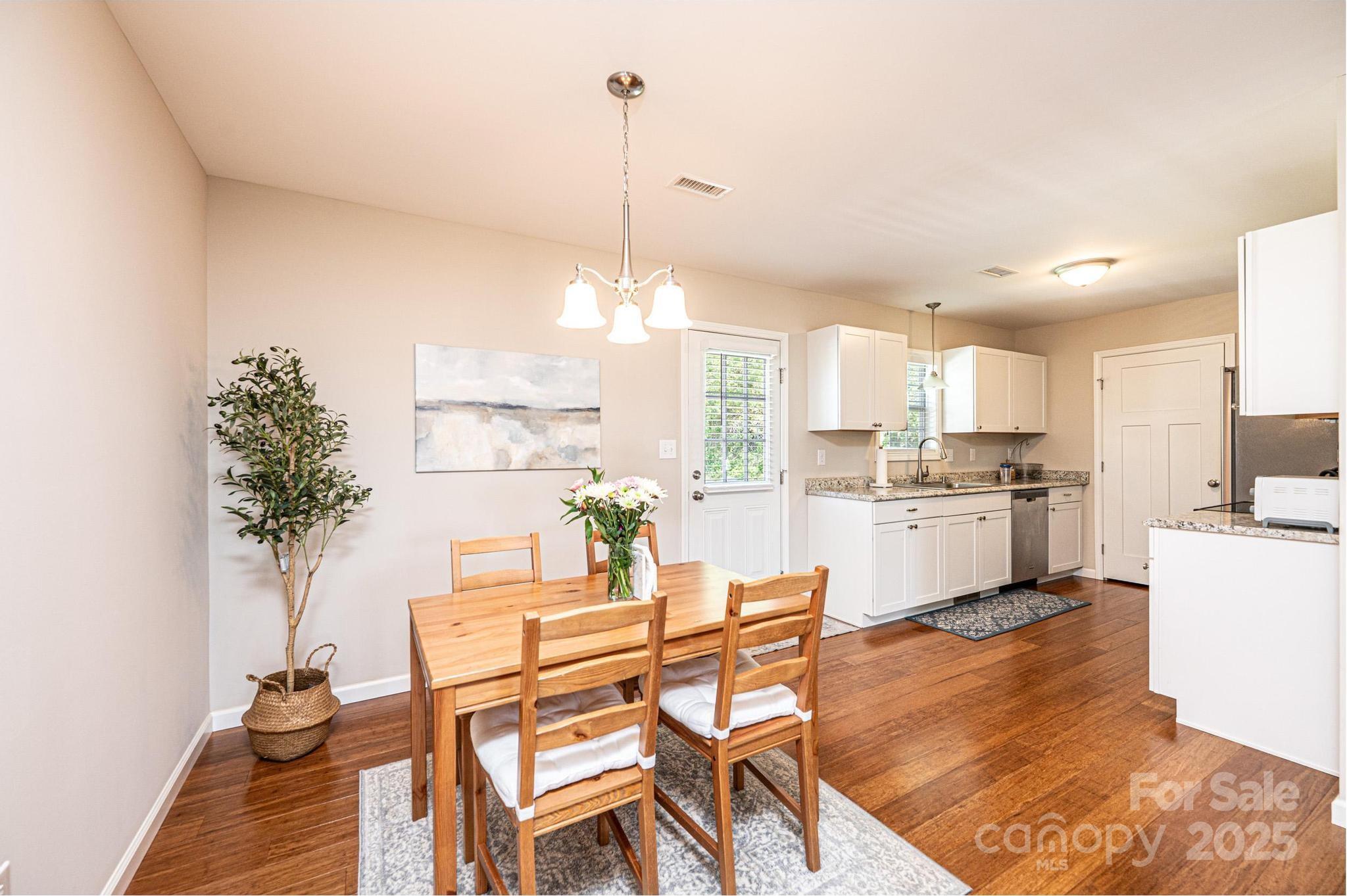 50 Serenity Lane Hickory, NC 28601 - Photo 16 of 33 a view of a kitchen with kitchen island and stainless steel appliances