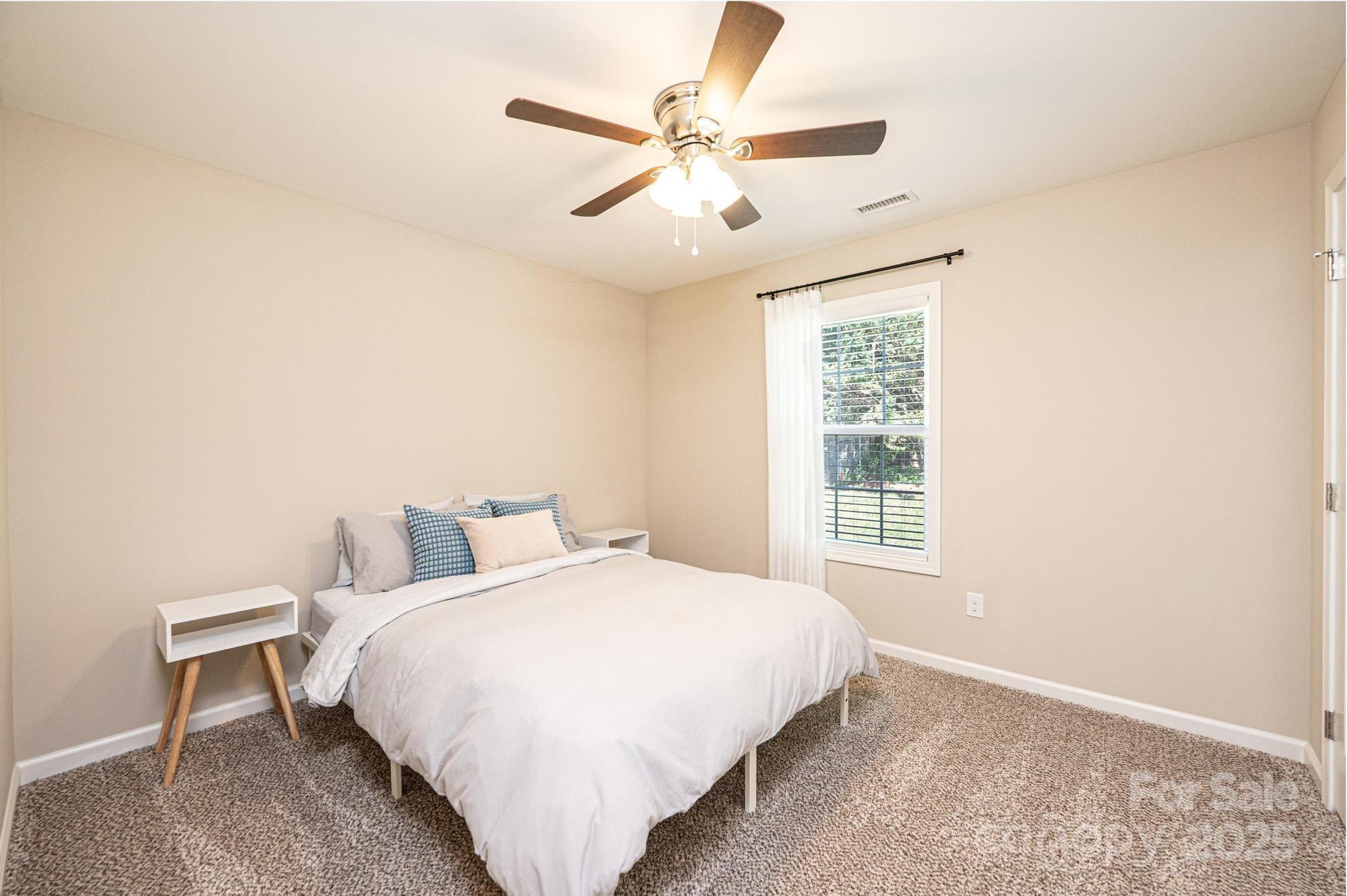 50 Serenity Lane Hickory, NC 28601 - Photo 26 of 33 a bedroom with a bed and window