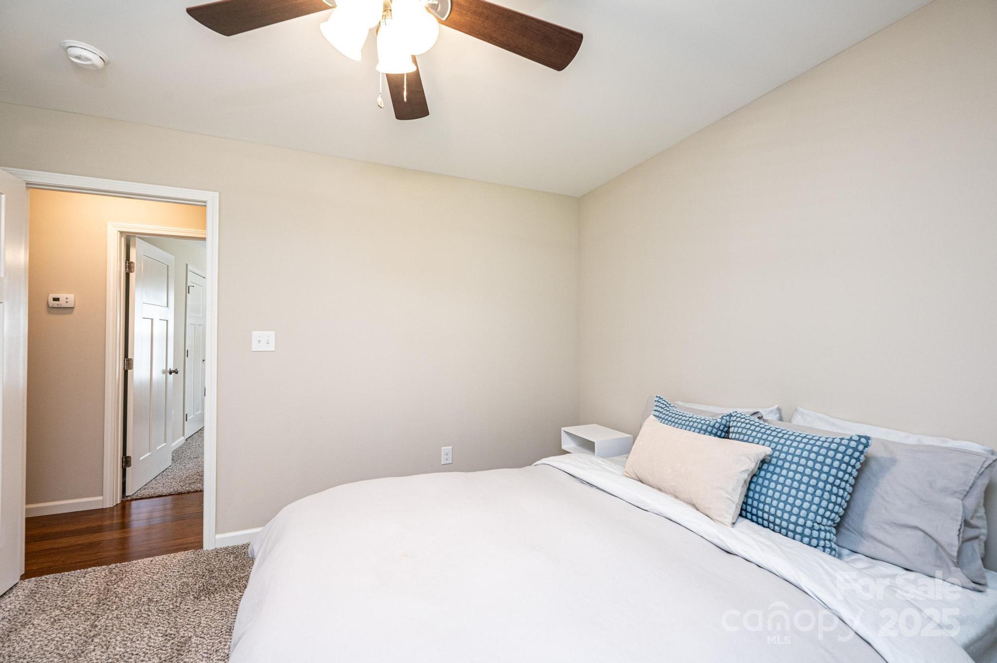 50 Serenity Lane Hickory, NC 28601 - Photo 27 of 33 a bedroom with a bed and cabinets