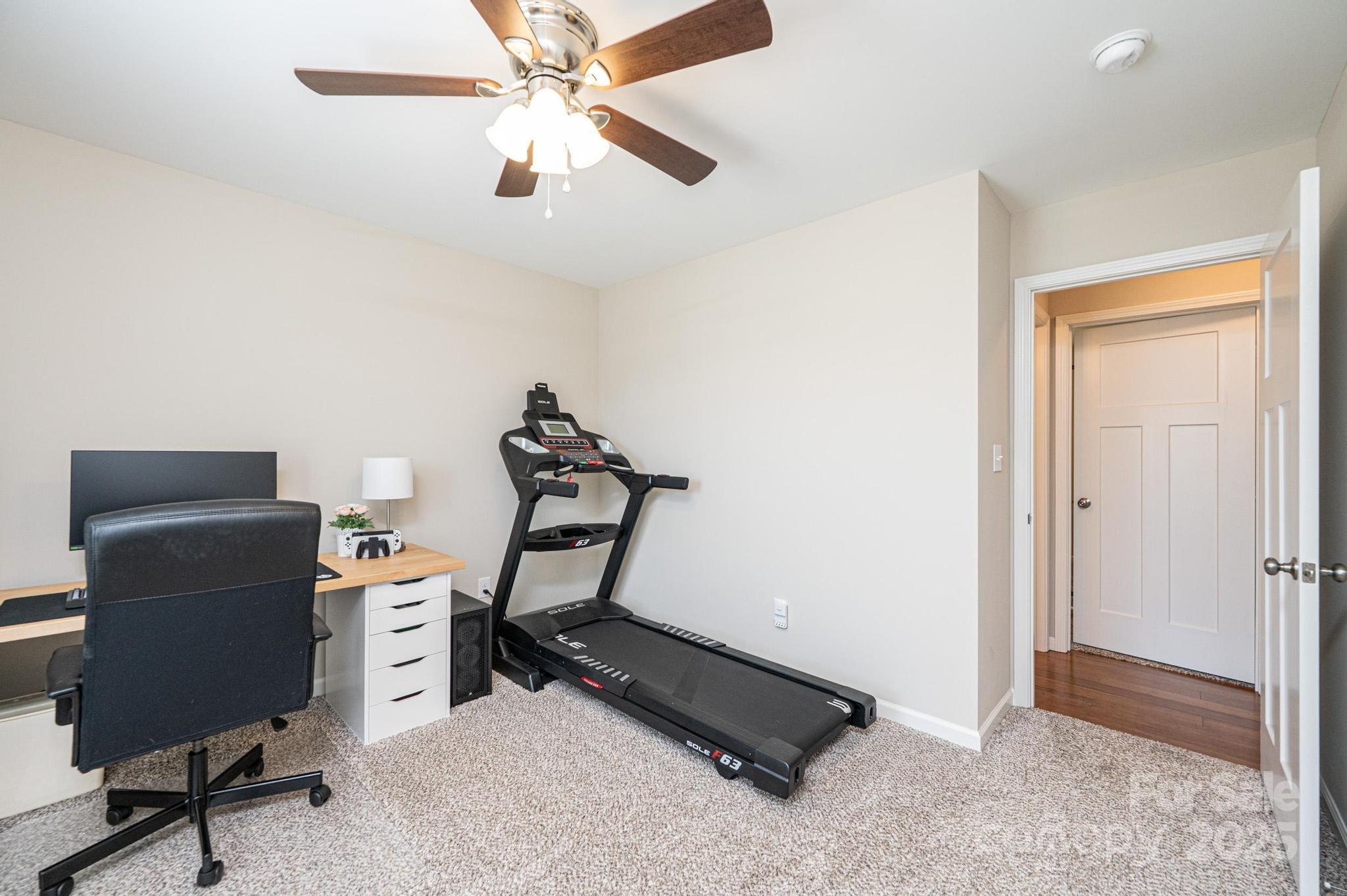 50 Serenity Lane Hickory, NC 28601 - Photo 32 of 33 a room with gym equipment and windows