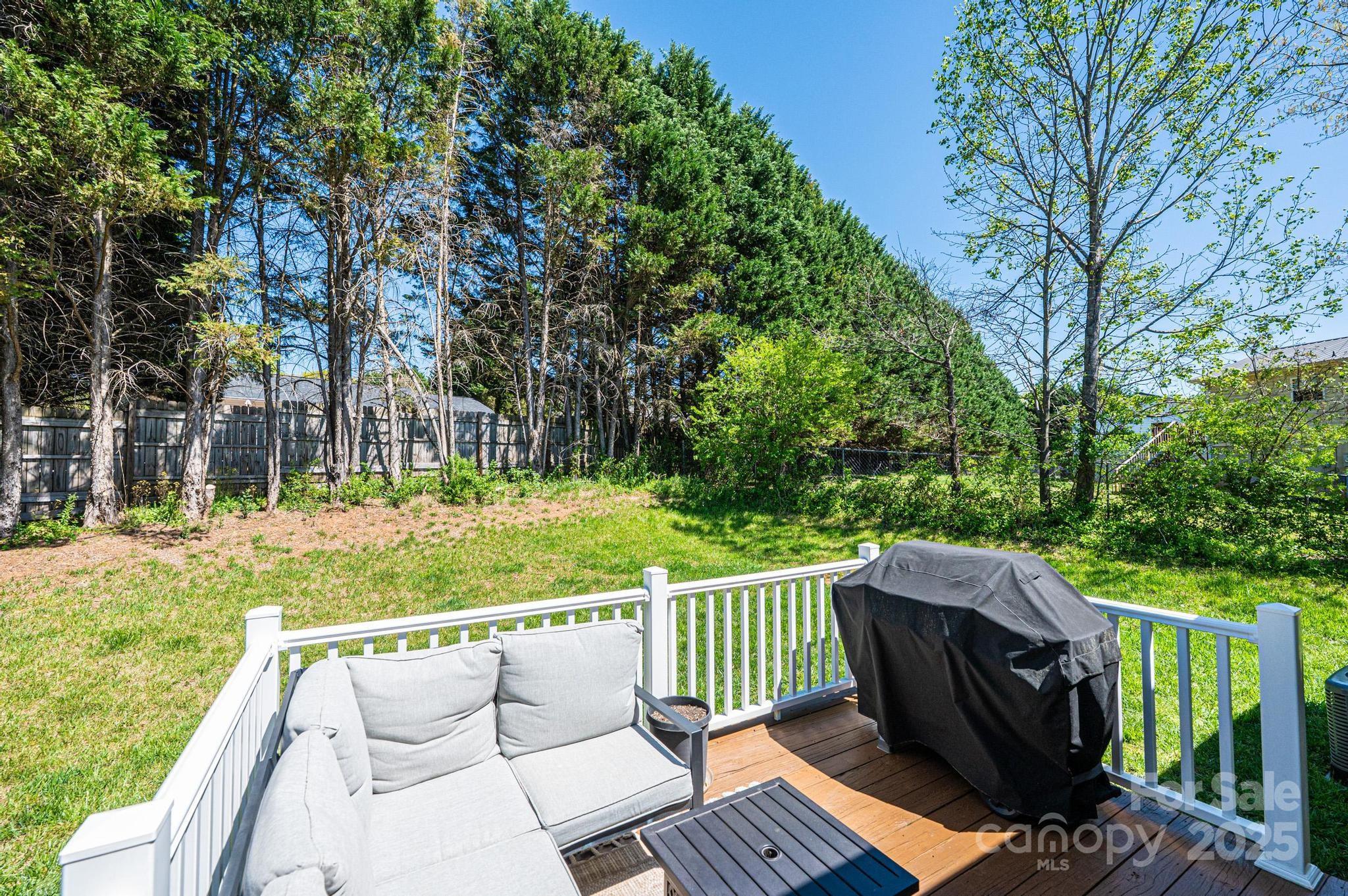 50 Serenity Lane Hickory, NC 28601 - Photo 6 of 33 a view of a deck with two chairs and a table