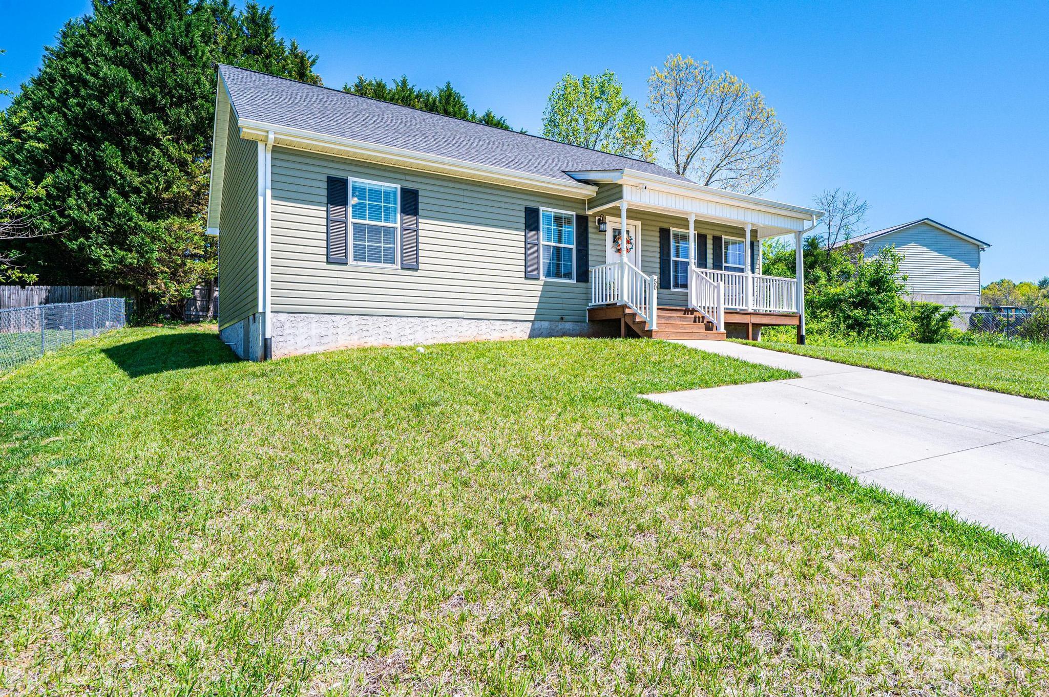 50 Serenity Lane Hickory, NC 28601 - Photo 8 of 33 a view of a house with backyard and garden