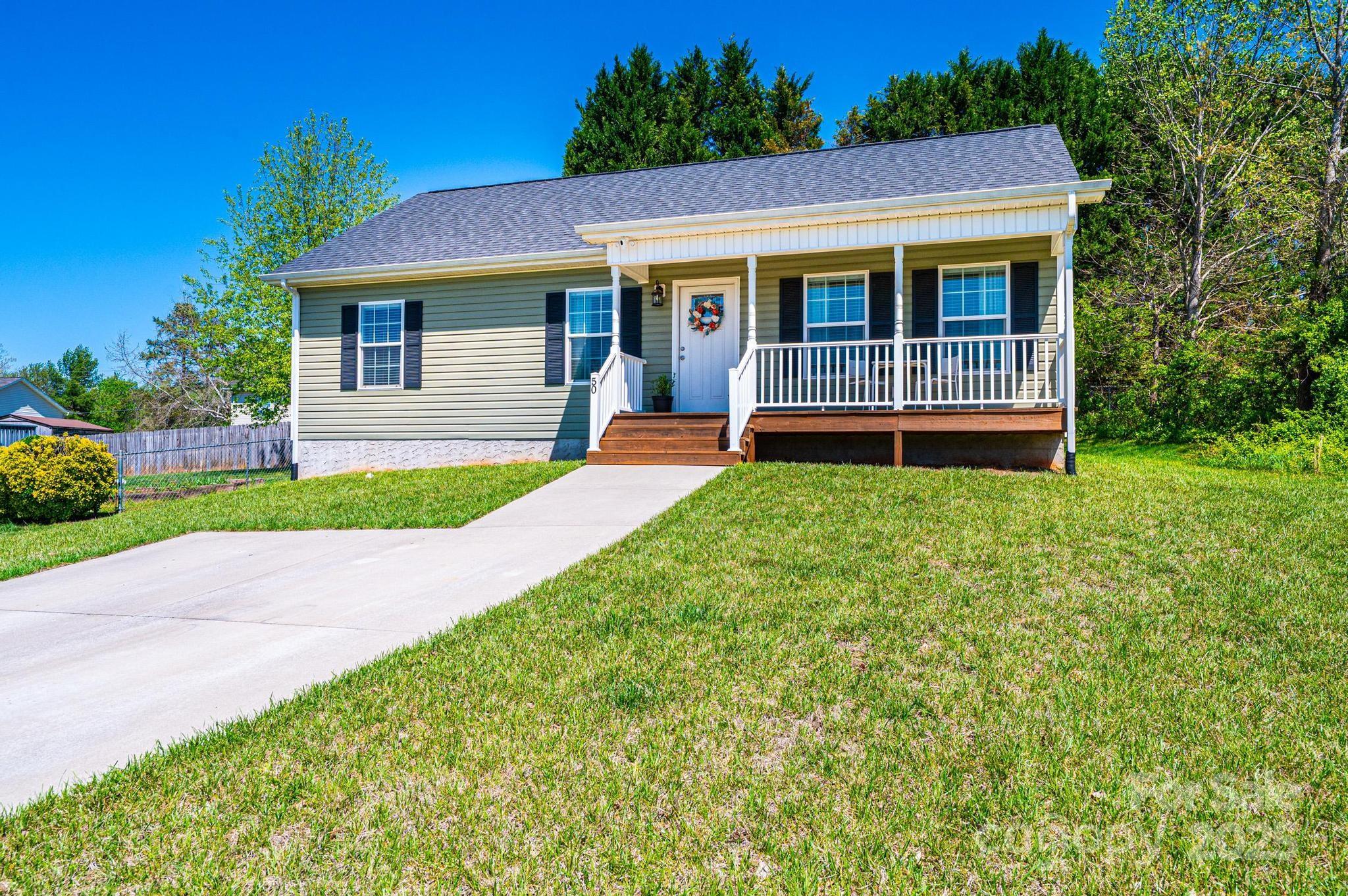 50 Serenity Lane Hickory, NC 28601 - Photo 9 of 33 a view of front of house with yard and green space
