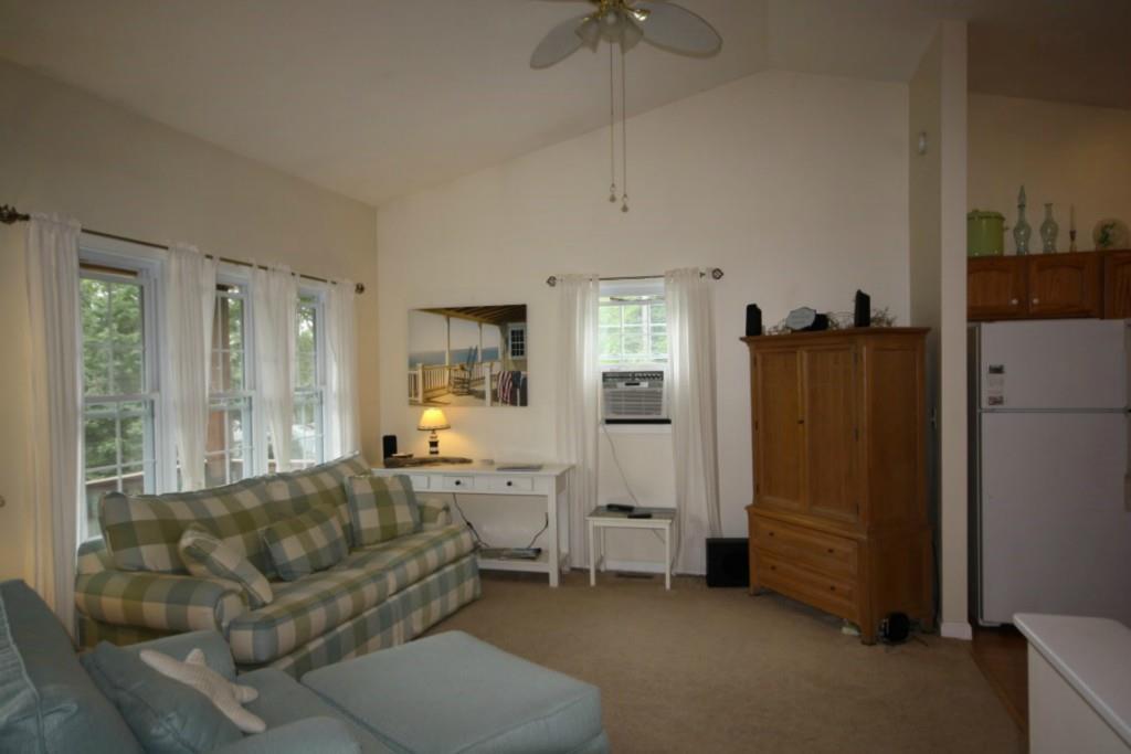 85 Lakeview Road West Boothbay Harbor, ME 04575 - Photo 5 of 24 The living room is open to the...