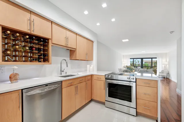 a view of a livingroom with furniture and a fireplace