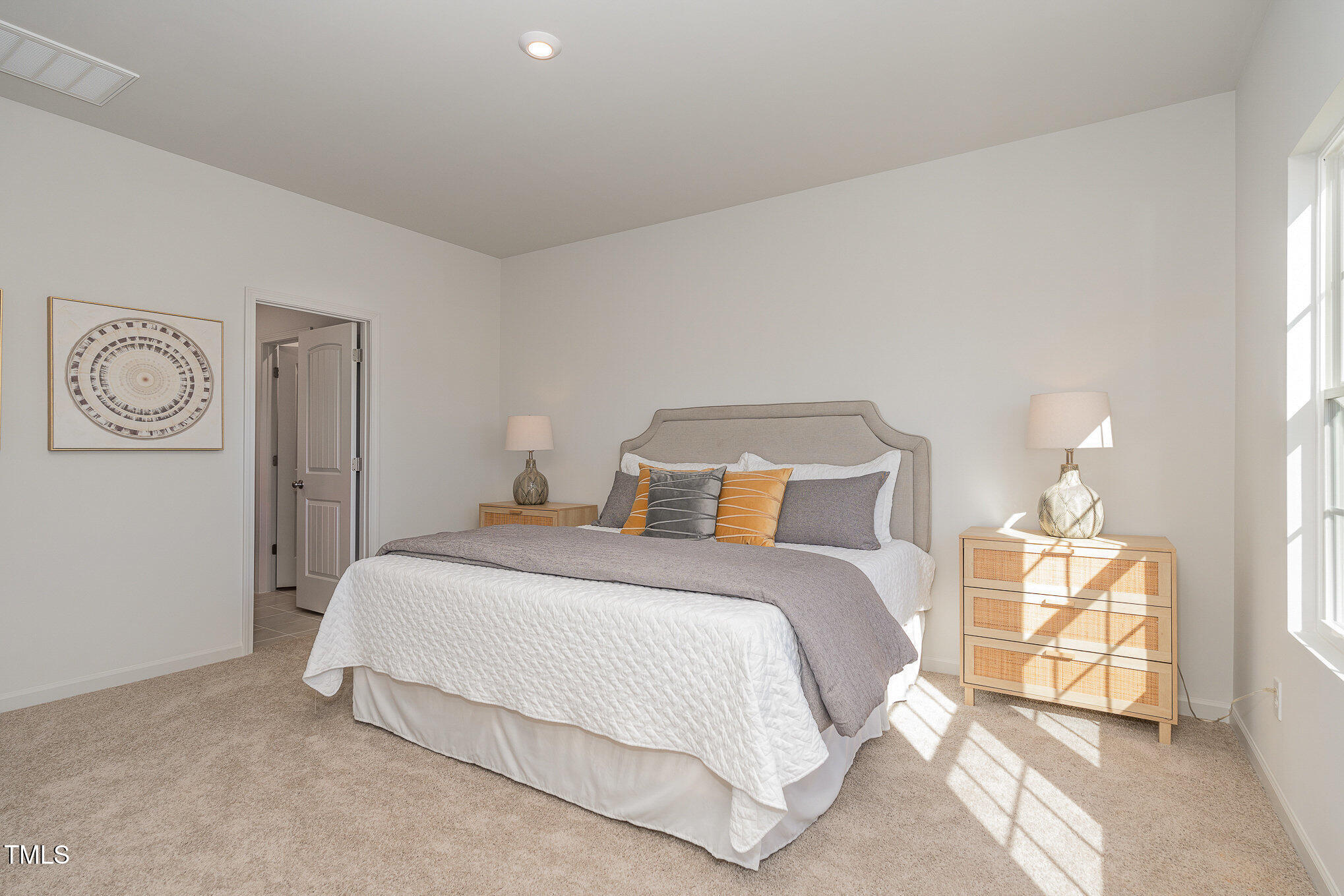 6748 Hardwick Lane Sims, NC 27880 - Photo 11 of 17 a bedroom with bed and window