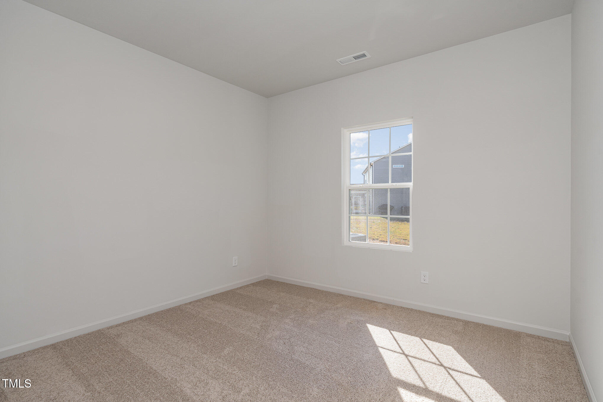 6748 Hardwick Lane Sims, NC 27880 - Photo 16 of 17 an empty room with a window