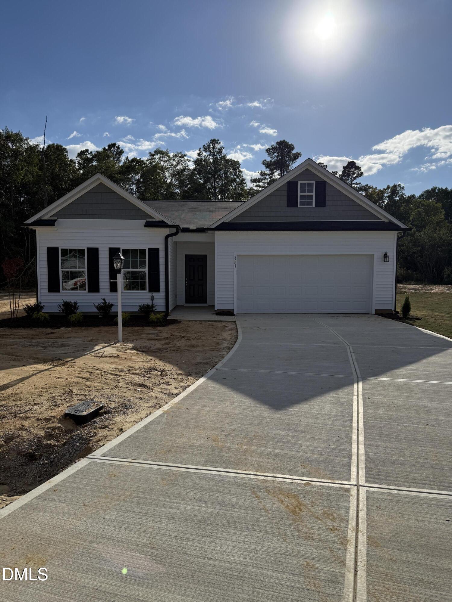6748 Hardwick Lane Sims, NC 27880 - Photo 2 of 17 a view of a house with a yard