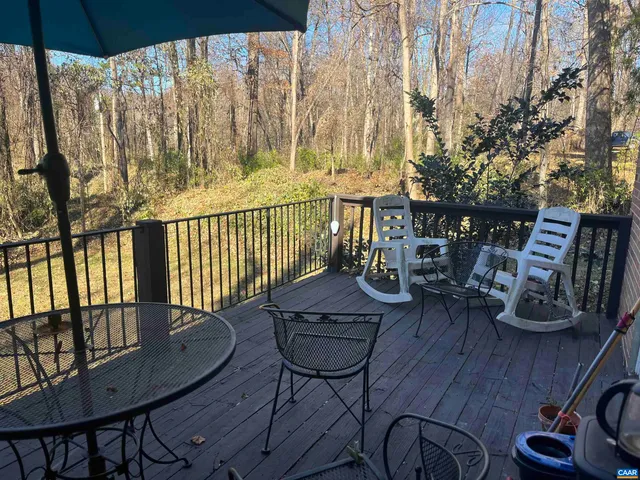 a view of a balcony with chairs