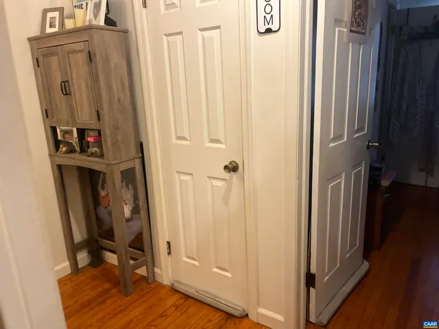 a view of a closet with storage