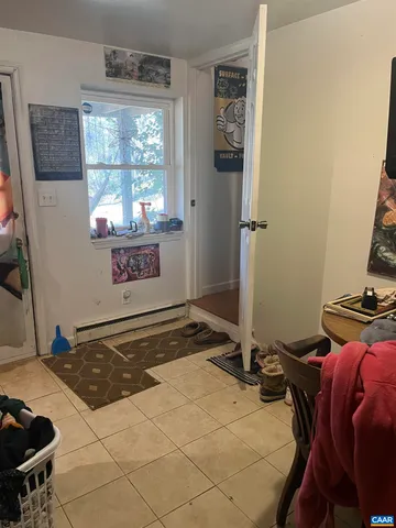 a view of a livingroom with furniture and windows