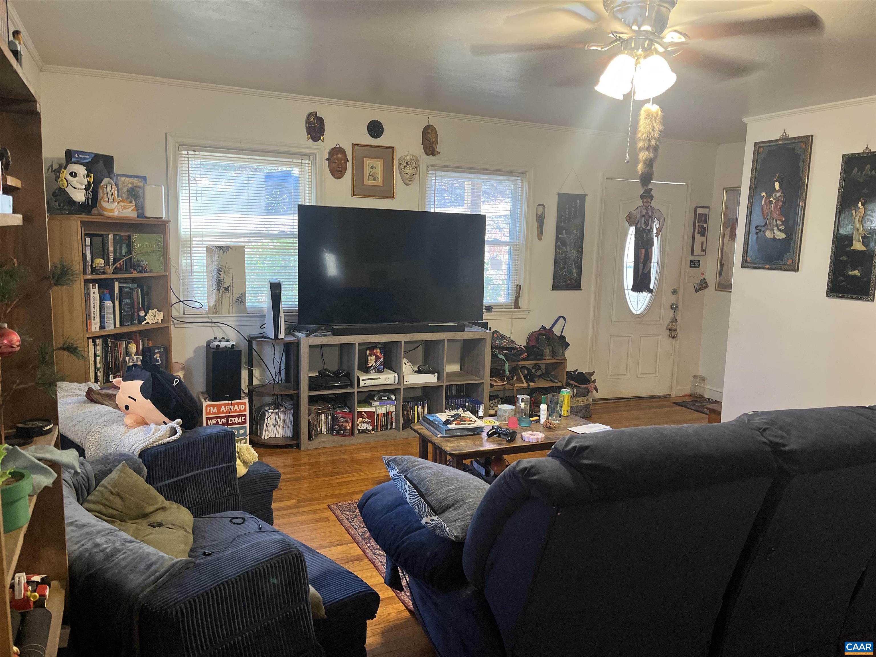 158 Buckingham Circle, Unit A&B Charlottesville, VA 22903 - Photo 6 of 23 a living room with furniture and a flat screen tv